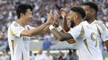 Son Heung-min (left) celebrates with Denis Bouanga in LAFC’s 4–2 win over the San Jose Earthquakes.