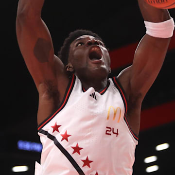 Apr 1, 2025; Brooklyn, NY, USA; McDonald's All American West forward Tounde Yessoufou (24) dunks the ball during the first half of the game at Barclays Center. Mandatory Credit: Pamela Smith-Imagn Images