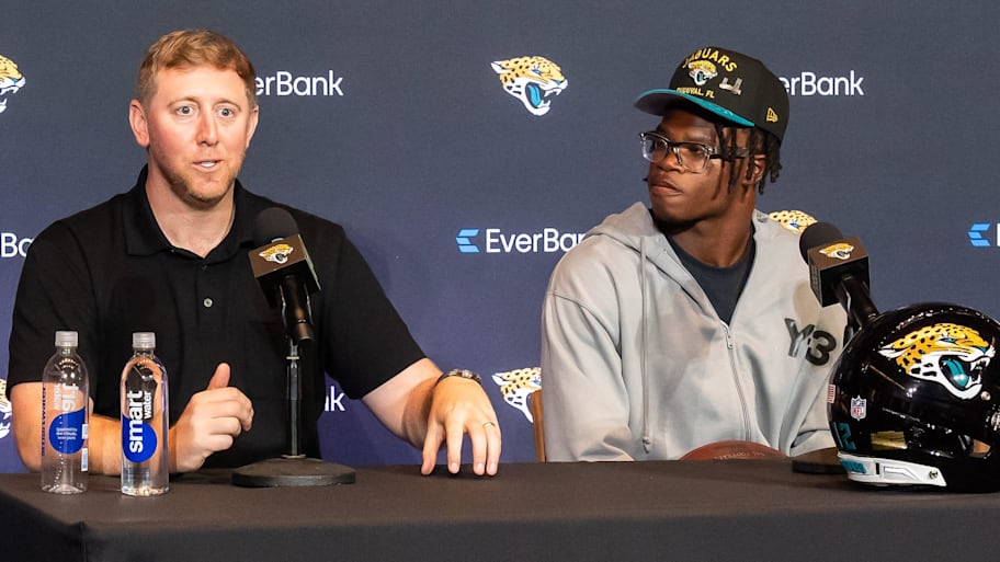 Jacksonville Jaguars Head Coach Liam Coen, left, answers questions during a press conference with the team’s first-round pick, Colorado Buffaloes wide receiver/defensive back Travis Hunter. | Doug Engle/Florida Times-Union / USA TODAY NETWORK via Imagn Images