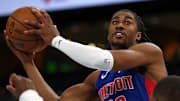 Oct 6, 2025; Memphis, Tennessee, USA; Detroit Pistons guard Jaden Ivey (23) drives to the basket as Memphis Grizzlies forward Cedric Coward (23) defends during the second quarter at FedExForum. Mandatory Credit: Petre Thomas-Imagn Images