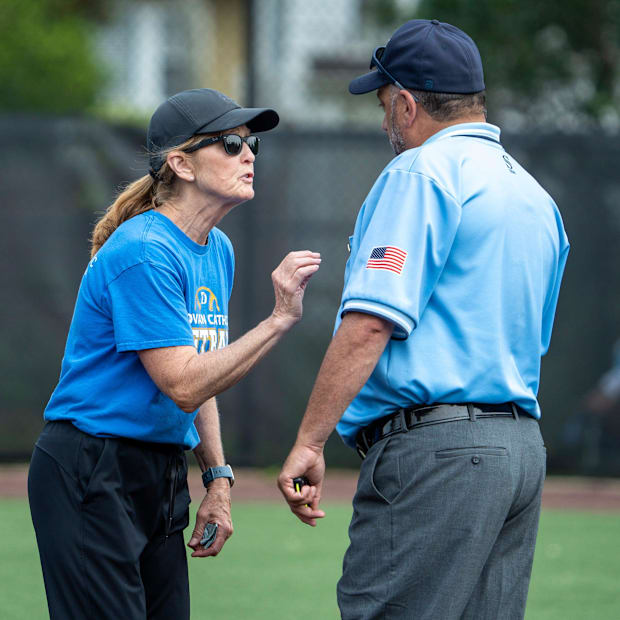 Due to change made by manufacturers, softball umpires are now allowed to wear charcoal gray slacks.