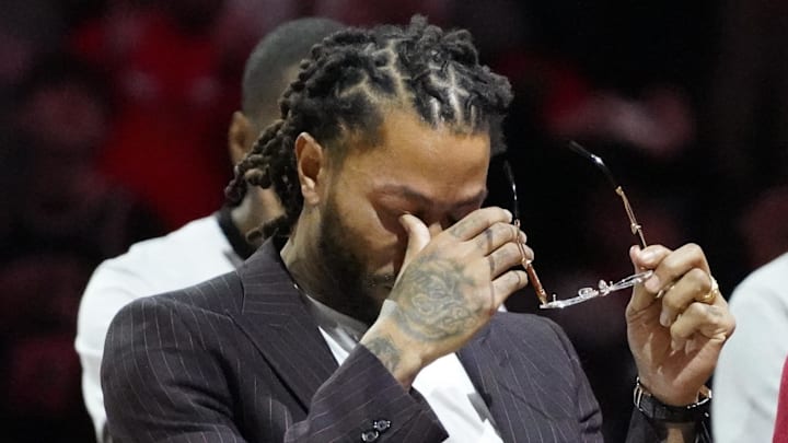 Jan 4, 2025; Chicago, Illinois, USA; Chicago Bulls and New York Knicks former player Derrick Rose reacts as he is honored at halftime of a game between the Chicago Bulls and the New York Knicks at United Center. Mandatory Credit: David Banks-Imagn Images