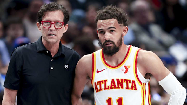 Atlanta Hawks head coach Quin Snyder speaks with Atlanta Hawks guard Trae Young (11) during the first half against the Dallas Mavericks at American Airlines Center.