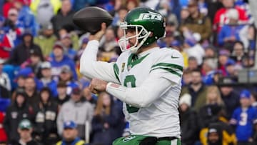 Dec 29, 2024; Orchard Park, New York, USA; New York Jets quarterback Aaron Rodgers (8) throws the ball against the Buffalo Bills during the second half at Highmark Stadium. 