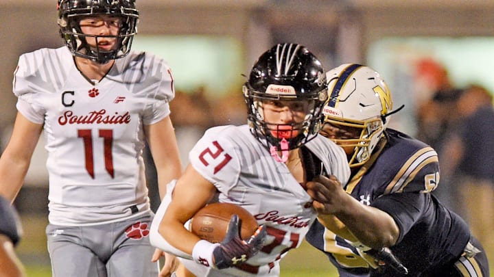 West Virginia commit Class of 2026 Cameron Mallory goes for a tackle during his sophomore season.