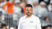 Oregon head coach Dan Lanning walks the field during warmups as the Oregon Ducks face the Penn State Nittany Lions on Sept. 27, 2025, at Beaver Stadium in University Park, Pennsylvania.