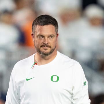 Oregon head coach Dan Lanning walks the field during warmups as the Oregon Ducks face the Penn State Nittany Lions on Sept. 27, 2025, at Beaver Stadium in University Park, Pennsylvania.