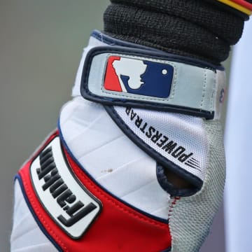 Mar 17, 2017; Fort Myers, FL, USA; A view of the MLB logo on the Franklin batting gloves worn by Boston Red Sox first baseman Hanley Ramirez (13) against the Houston Astros at JetBlue Park. The Astros won 6-2. Mandatory Credit: Aaron Doster-USA TODAY Sports