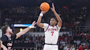 Mar 20, 2025; Providence, RI, USA;  St. John's Red Storm guard Simeon Wilcher (7) controls the ball against Omaha Mavericks guard Tony Osburn (32) during the first half at Amica Mutual Pavilion. Mandatory Credit: Gregory Fisher-Imagn Images