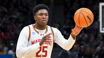 Mar 23, 2025; Seattle, WA, USA; Maryland Terrapins center Derik Queen (25) passes the ball against the Colorado State Rams in the first half at Climate Pledge Arena. Mandatory Credit: Steven Bisig-Imagn Images