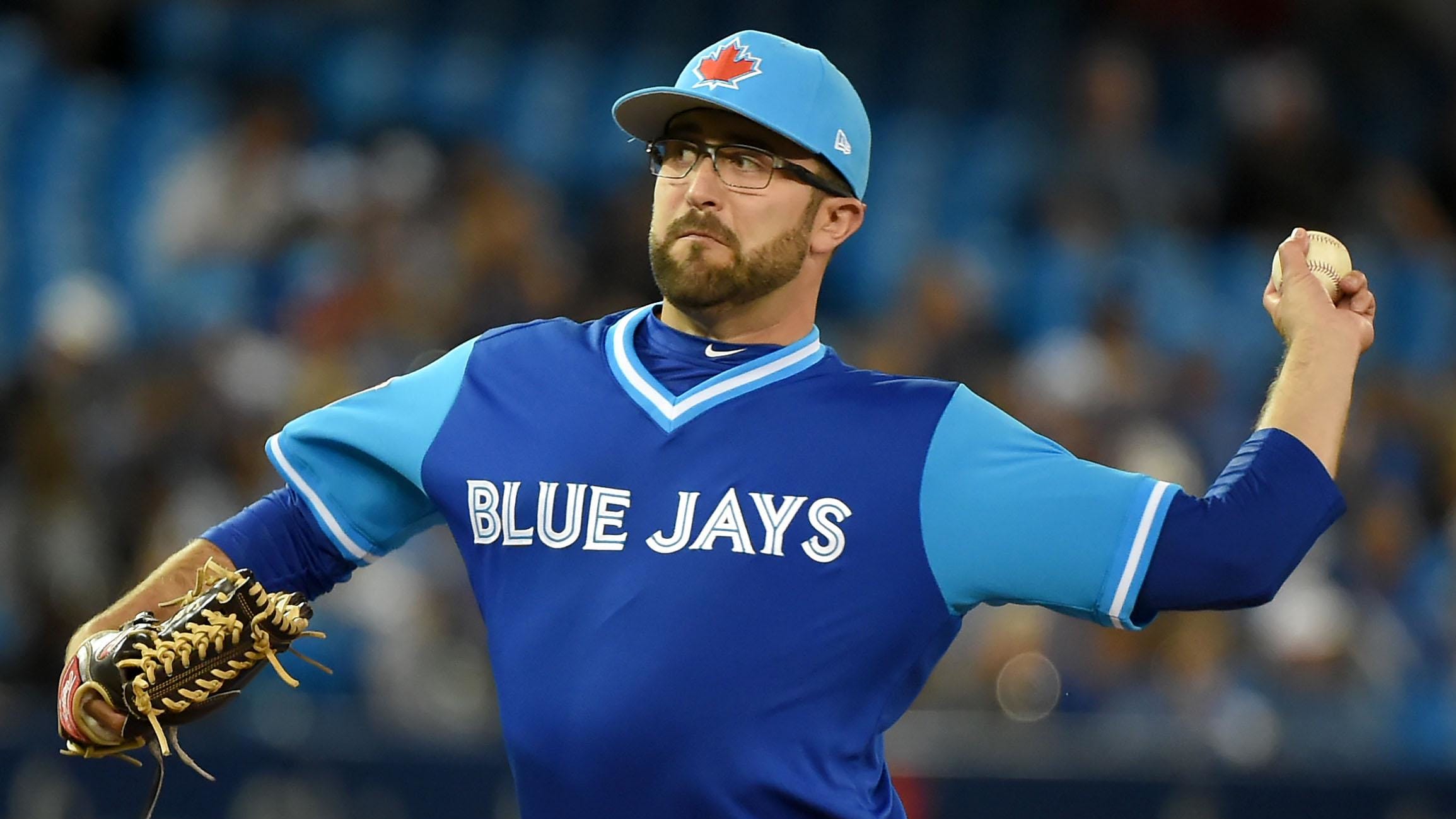 TJ House delivers a pitch for the Toronto Blue Jays