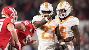 Tennessee defensive back Boo Carter (23) celebrates with Tennessee defensive back Edrees Farooq (15) after returning a punt during a college football game between Tennessee and Georgia at Sanford Stadium in Athens, Ga., on Saturday, November 16, 2024.