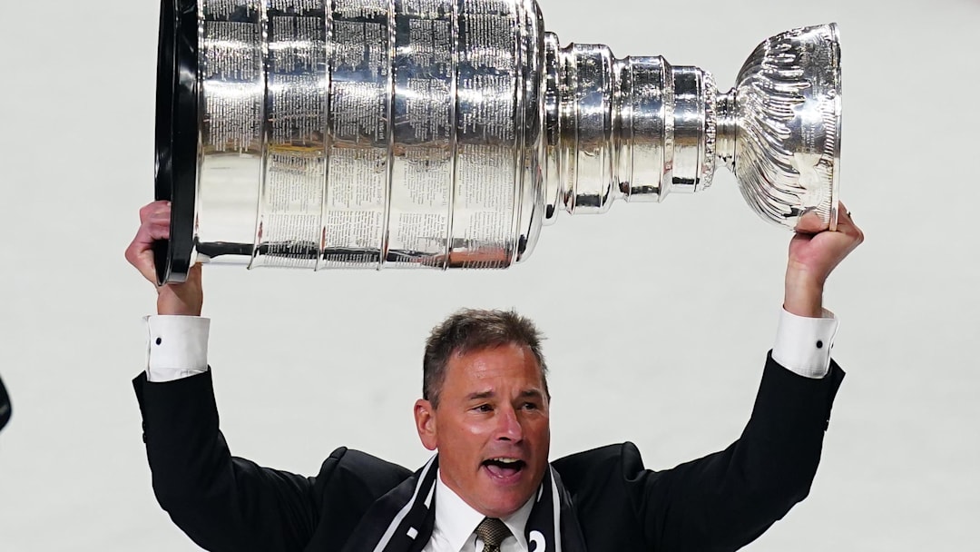 Jun 13, 2023; Las Vegas, Nevada, USA; Vegas Golden Knights head coach Bruce Cassidy hoists the Stanley Cup after defeating the Florida Panthers in game five of the 2023 Stanley Cup Final at T-Mobile Arena. Mandatory Credit: Lucas Peltier-Imagn Images