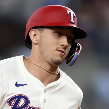 Jun 18, 2024; Arlington, Texas, USA; Texas Rangers left fielder Wyatt Langford (36) rounds the bases after hitting a three run home run against the New York Mets in the fifth inning at Globe Life Field. Mandatory Credit: Tim Heitman-USA TODAY Sports