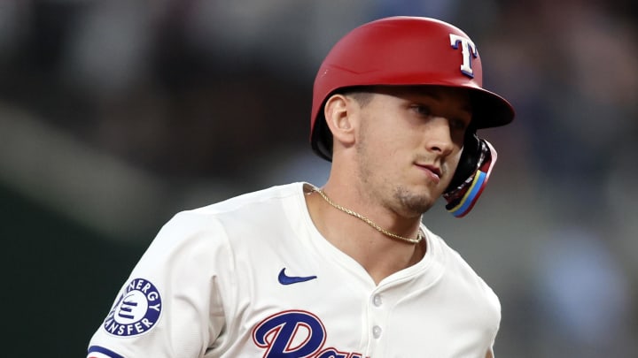 Jun 18, 2024; Arlington, Texas, USA; Texas Rangers left fielder Wyatt Langford (36) rounds the bases after hitting a three run home run against the New York Mets in the fifth inning at Globe Life Field. Mandatory Credit: Tim Heitman-USA TODAY Sports