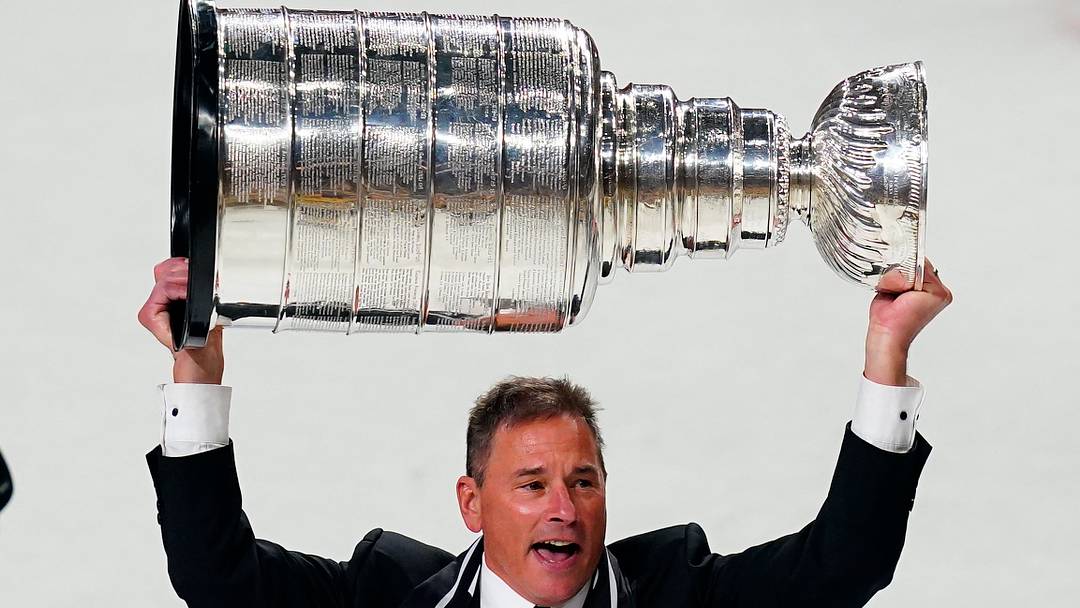 Jun 13, 2023; Las Vegas, Nevada, USA; Vegas Golden Knights head coach Bruce Cassidy hoists the Stanley Cup after defeating the Florida Panthers in game five of the 2023 Stanley Cup Final at T-Mobile Arena. Mandatory Credit: Lucas Peltier-USA TODAY Sports Jun 13, 2023; Las Vegas, Nevada, USA; Vegas Golden Knights head coach Bruce Cassidy hoists the Stanley Cup after defeating the Florida Panthers in game five of the 2023 Stanley Cup Final at T-Mobile Arena. Mandatory Credit: Lucas Peltier-USA TODAY Sports