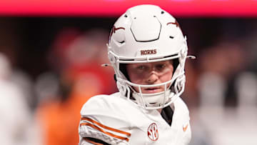 Dec 7, 2024; Atlanta, GA, USA; Texas Longhorns quarterback Quinn Ewers (3) practices before the 2024 SEC Championship game at Mercedes-Benz Stadium. Mandatory Credit: Dale Zanine-Imagn Images