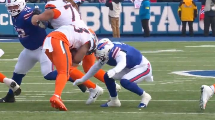 Taron Johnson takes a helmet to helmet hit against the Broncos. Taron Johnson takes a helmet to helmet hit against the Broncos.