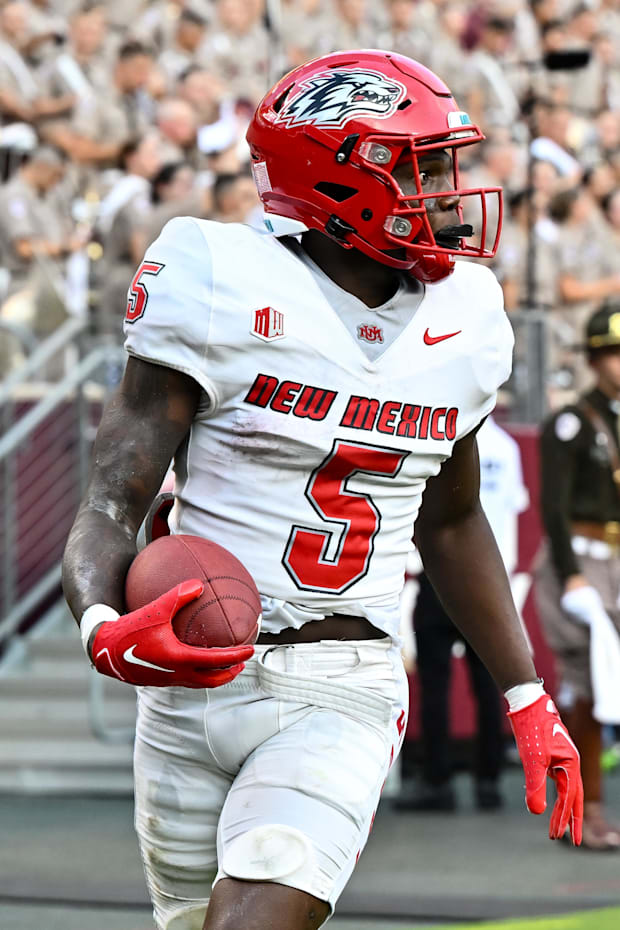 New Mexico Lobos running back Jacory Croskey-Merritt runs the ball in for a touchdown during the second quarter. New Mexico Lobos running back Jacory Croskey-Merritt runs the ball in for a touchdown during the second quarter.
