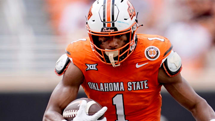 Oklahoma State's De'Zhaun Stribling (1) gets by South Dakota State's Myles Taylor (2) after a reception in the second half of the college football game between the Oklahoma State Cowboys and South Dakota State Jackrabbits at Boone Pickens Stadium in Stillwater, Okla., Saturday, Aug., 31, 2024.