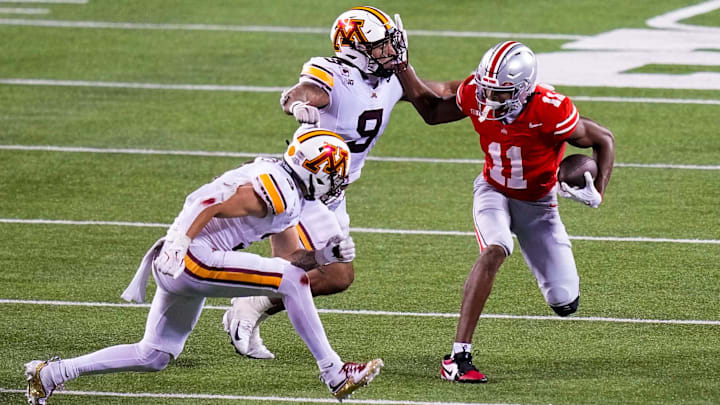 Ohio State Buckeyes wide receiver Quincy Porter (11) runs the ball against the Minnesota Golden Gophers in the second half of the NCAA football game at Ohio Stadium on Saturday, Oct. 4, 2025 in Columbus, Ohio.