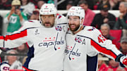 Washington Capitals left wing Ovechkin celebrates his goal with  right wing Wilson against the Carolina Hurricanes during the second period at Lenovo Center. 