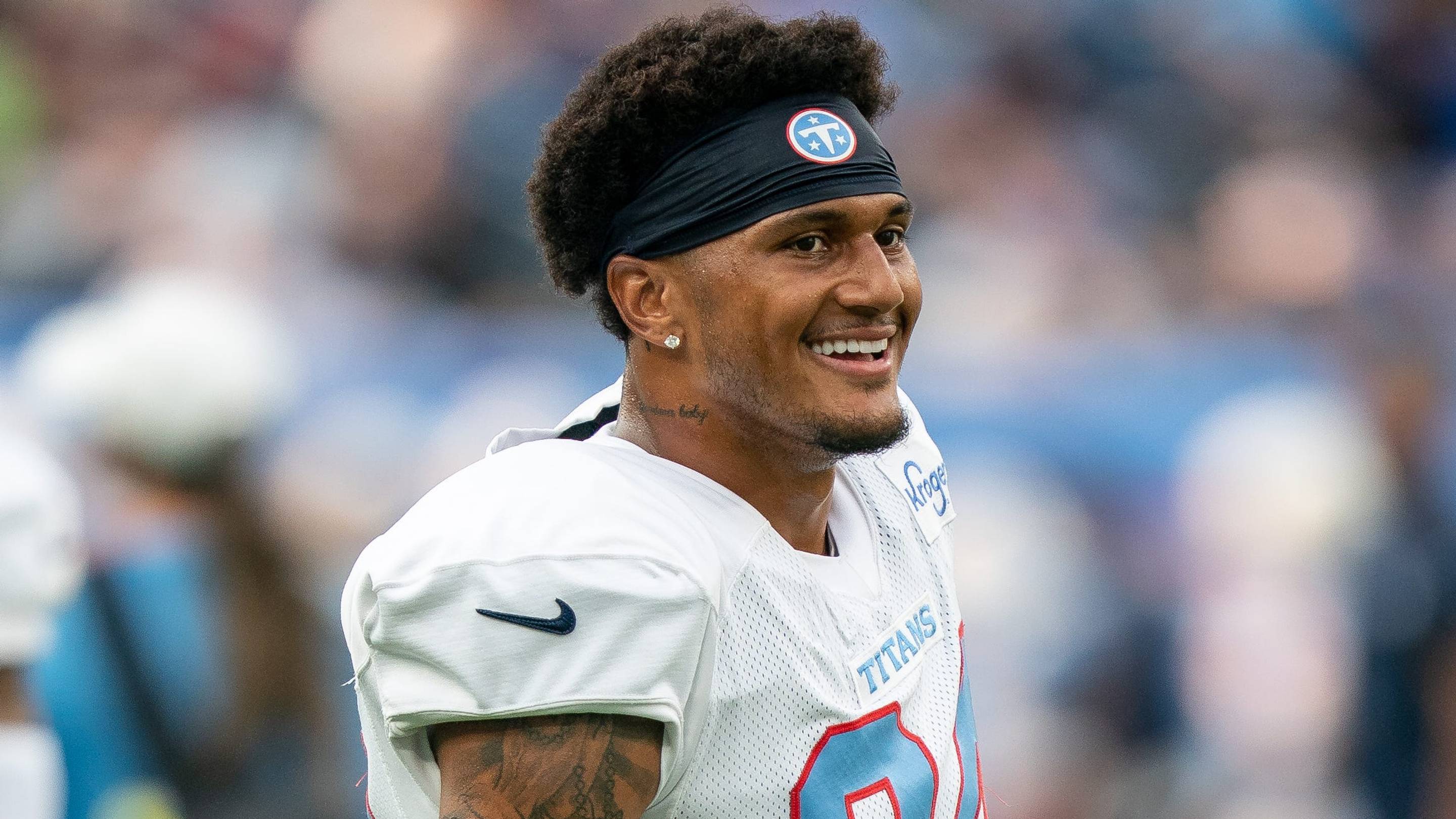 Tennessee Titans cornerback Alontae Taylor (24) talks with teammates during the Blue and White Stadium Scrimmage at Nissan Stadium in Nashville, Tenn., Friday, Aug. 7, 2026.