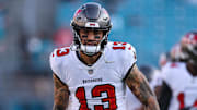 Aug 17, 2024; Jacksonville, Florida, USA; Tampa Bay Buccaneers wide receiver Mike Evans (13) warms up before a preseason game against the Jacksonville Jaguars at EverBank Stadium. Mandatory Credit: Nathan Ray Seebeck-Imagn Images