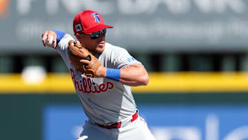 Mar 7, 2025; Bradenton, Florida, USA; Philadelphia Phillies second baseman Rafael Lantigua (83) throws to first base against the Pittsburgh Pirates in the fourth inning during spring training at LECOM Park.
