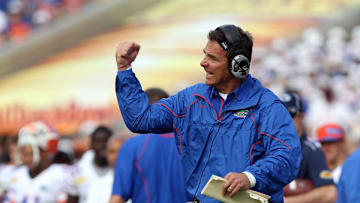 January 1, 2011; Tampa, FL, USA;  Florida Gators head coach Urban Meyer reacts on the sidelines during the second half of their game against the Penn State Nittany Lions of the 2011 Outback Bowl at Raymond James Stadium. Florida Gators defeated the Penn State Nittany Lions 37-24. Mandatory Credit: Kim Klement-Imagn Images