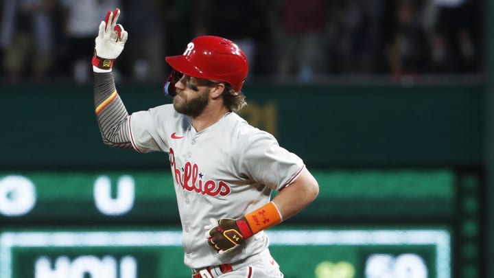 Jul 20, 2024; Pittsburgh, Pennsylvania, USA;  Philadelphia Phillies first baseman Bryce Harper (3) gestures as he runs the bases after hitting a solo home run against the Pittsburgh Pirates during the ninth inning at PNC Park. The Pirates won 4-1.