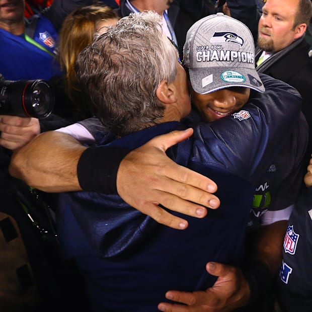 Seattle Seahawks quarterback Russell Wilson (right) celebrates with head coach Pete Carroll Seattle Seahawks quarterback Russell Wilson (right) celebrates with head coach Pete Carroll