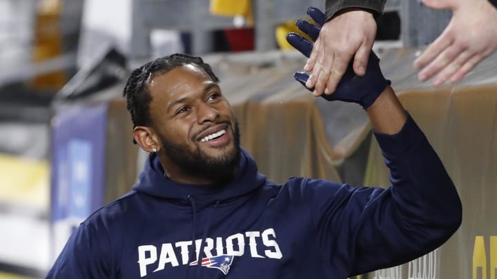 Dec 7, 2023; Pittsburgh, Pennsylvania, USA; New England Patriots wide receiver JuJu Smith-Schuster (7) greets fans before the game against the Pittsburgh Steelers at Acrisure Stadium. 