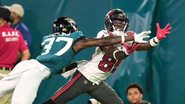 Jacksonville Jaguars cornerback Tre Flowers (37) helps prevent a potential touchdown pass to Tampa Bay Buccaneers wide receiver Latreal Jones (85) during fourth quarter action. The Jacksonville Jaguars hosted the Tampa Bay Buccaneers at EverBank Stadium for the Jaguars second preseason game of the season Saturday, August 17, 2024. The Jaguars came away with a 20 to 7 victory over the Buccaneers. [Bob Self/Florida Times-Union]