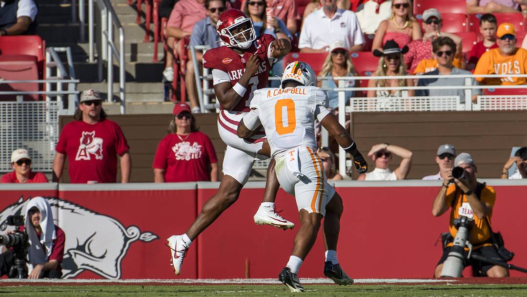Oct 10, 2026; Fayetteville, Arkansas, USA; Arkansas Razorbacks quarterback KJ Jackson (7) is pressured by Tennessee Volunteers linebacker Amare Campbell (0) during the second quarter at Donald W. Reynolds Razorback Stadium. Mandatory Credit: Brett Rojo-Imagn Images Oct 10, 2026; Fayetteville, Arkansas, USA; Arkansas Razorbacks quarterback KJ Jackson (7) is pressured by Tennessee Volunteers linebacker Amare Campbell (0) during the second quarter at Donald W. Reynolds Razorback Stadium. Mandatory Credit: Brett Rojo-Imagn Images