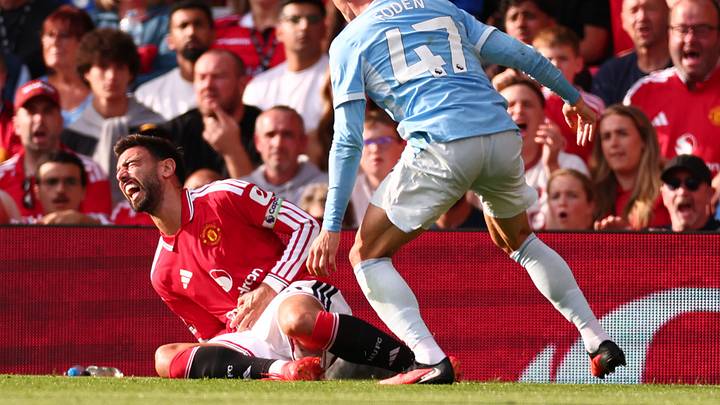 Bruno Fernandes (left) and Phil Foden got tangled up early in the Manchester Derby. Bruno Fernandes (left) and Phil Foden got tangled up early in the Manchester Derby.