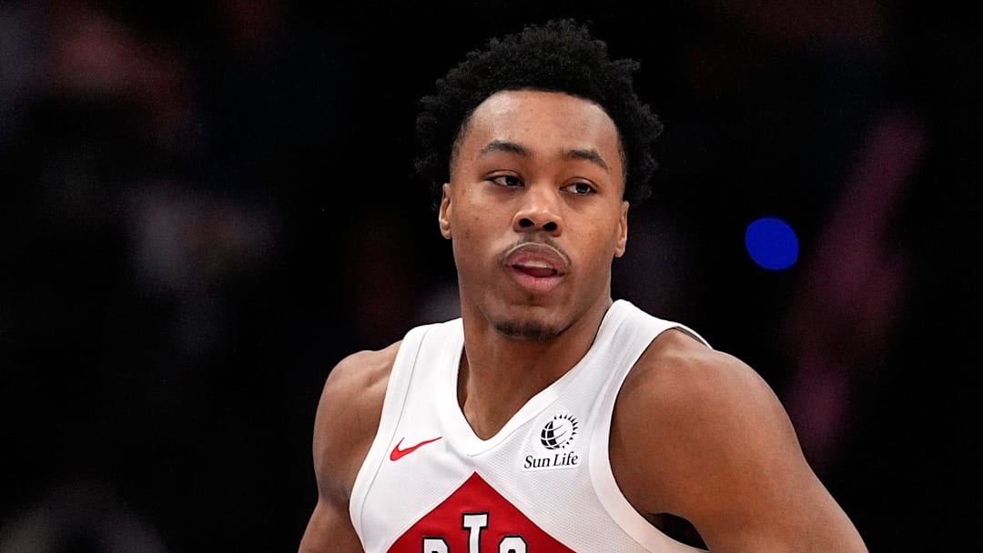 Toronto Raptors forward Scottie Barnes (4) brings the ball up court against the Charlotte Hornets during the second half at Spectrum Center.