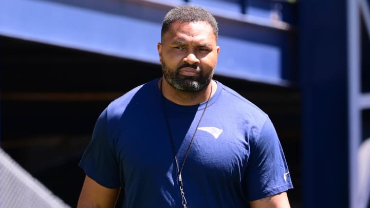 Jun 10, 2024; Foxborough, MA, USA; New England Patriots head coach Jerod Mayo walks to the microphones for a press conference at minicamp at Gillette Stadium. Mandatory Credit: Eric Canha-USA TODAY Sports