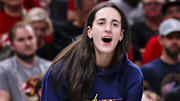 Jun 26, 2025; Indianapolis, Indiana, USA; Indiana Fever guard Caitlin Clark (22) reacts to the action against the Los Angeles Sparks during the first half at Gainbridge Fieldhouse. Mandatory Credit: Grace Smith/INDIANAPOLIS STAR-Imagn Images