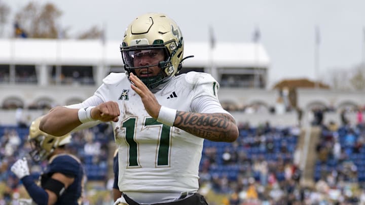 Nov 15, 2025; Annapolis, Maryland, USA; South Florida Bulls quarterback Byrum Brown (17) reacts after scoring a touchdown against the Navy Midshipmen  during the second half at Navy-Marine Corps Memorial Stadium. Navy Midshipmen defeated South Florida Bulls 41-28. Mandatory Credit: Tommy Gilligan-Imagn Images
