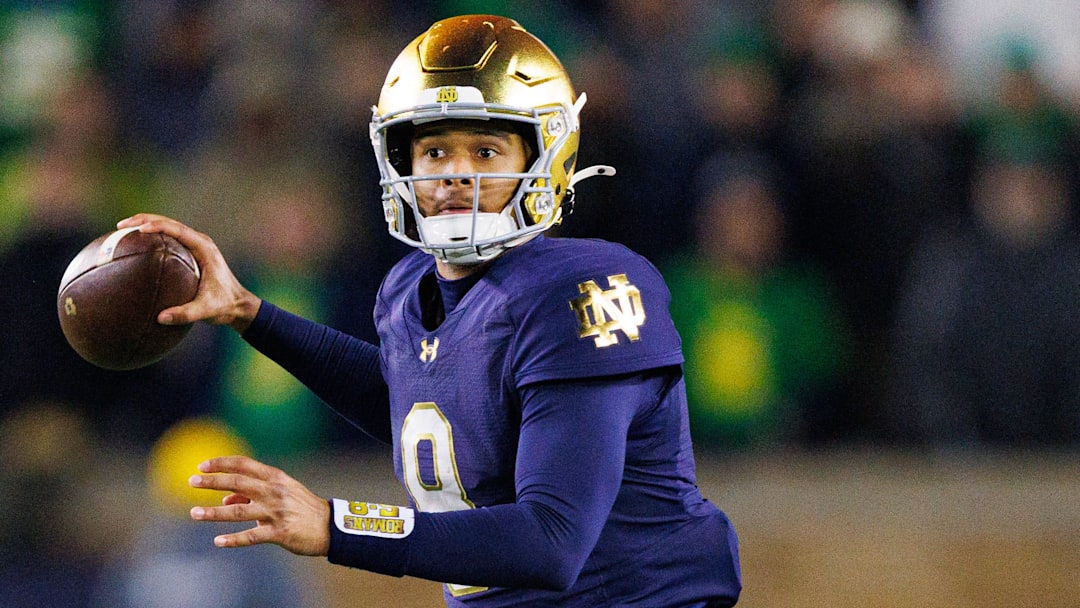 Notre Dame quarterback Kenny Minchey throws the ball in the second half of a NCAA football game against Syracuse at Notre Dame Stadium on Saturday, Nov. 22, 2025, in South Bend.
