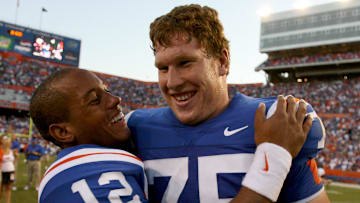 Florida Gators quarterback Chris Leak celebrates with offensive lineman (75) Phil Trautwein after the Gators defeated the Alabama Crimson Tide in 2006.