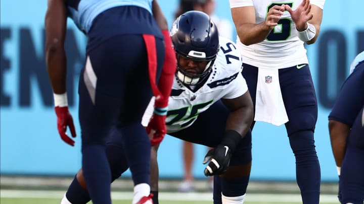 Aug 17, 2024; Nashville, Tennessee, USA; Seattle Seahawks guard Anthony Bradford sets up before a play against the Tennessee Titans at Nissan Stadium. Mandatory Credit: Casey Gower-USA TODAY Sports