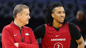 Arkansas Razorbacks coach John Calipari and guard Boogie Fland share a lighter moment at practice at the Chase Center in San Francisco, Calif., prior to the Hogs' Sweet 16 matchup against the Texas Tech Red Raiders.
