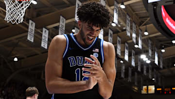 Dec 2, 2025; Durham, North Carolina, USA; Duke Blue Devils forward Cameron Boozer (12) reacts after forcing a turnover against the Florida Gators during the first half at Cameron Indoor Stadium. Mandatory Credit: Rob Kinnan-Imagn Images