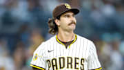 Sep 13, 2025; San Diego, California, USA; San Diego Padres starting pitcher Dylan Cease (84) reacts after walking a batter during the fourth inning against the Colorado Rockies at Petco Park. Mandatory Credit: David Frerker-Imagn Images