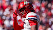 Oct 4, 2025; Tucson, Arizona, USA; Arizona Wildcats wide receiver Tre Spivey (12) celebrates after a play during the third quarter of the game against the Oklahoma State Cowboys at Arizona Stadium. Mandatory Credit: Aryanna Frank-Imagn Images
