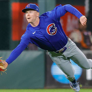 Jun 24, 2024; San Francisco, California, USA; Chicago Cubs outfielder Pete Crow-Armstrong (52) dives for the ball during the ninth inning against the San Francisco Giants at Oracle Park. All Giants players wore the number 24 in honor of Giants former player Willie Mays