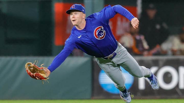 Jun 24, 2024; San Francisco, California, USA; Chicago Cubs outfielder Pete Crow-Armstrong (52) dives for the ball during the ninth inning against the San Francisco Giants at Oracle Park. All Giants players wore the number 24 in honor of Giants former player Willie Mays