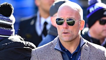 Nov 20, 2022; Baltimore, Maryland, USA;  Baltimore Ravens general manager Eric DeCosta walks on the field before the game against the Carolina Panthers at M&T Bank Stadium. Mandatory Credit: Tommy Gilligan-Imagn Images